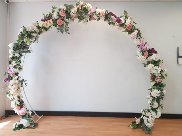 white bridal arch backdrop to hire 