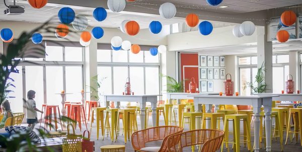 orange and yellow tolix stools