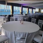 white table cloth for round table and white tiffany chairs 