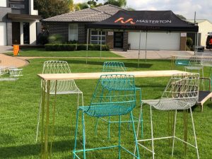 Gold hairpin bar table, white and turquoise bar stools